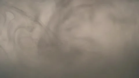 Thick gray smoke swirling Stock Footage 307908670