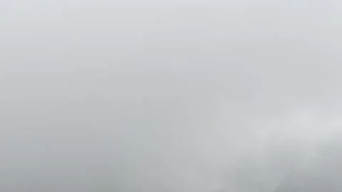 Thick Grey Fog and Moving Clouds Minimal Atmospheric Background Stock Footage 346337415