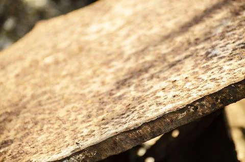 Thick layer of metal with selective focus. Background for industrial metalwor Stock Photos