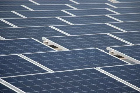 Thick layer solar modules mounted in landscape and low angle tilt Stock Photos