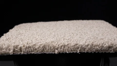 Thick light brown carpet rotating medium closeup 4k Stock Footage 108010027