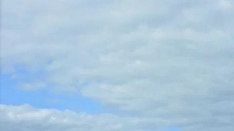 Thick light clouds gradually diverge. Improving the weather. Cloud time lapse. Stock Footage 164058963