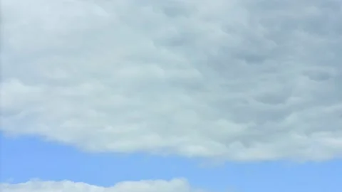 Thick light clouds gradually diverge. Improving the weather Stock Footage 170623662