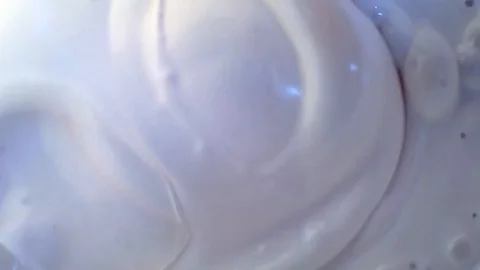 Thick liquid in which bubbles burst.closeup Stock Footage 105681098