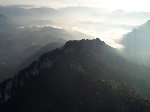 Thick low hanging fog was observed surrounding the mountainous area. Video stock 80971688