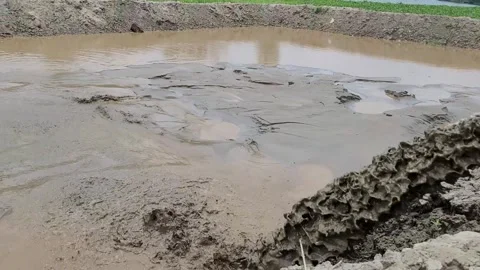 Thick Mud and Sludge Pumping from Dredging Pipe Vídeos de archivo 338185055