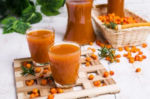 Thick orange drink Stock Photos