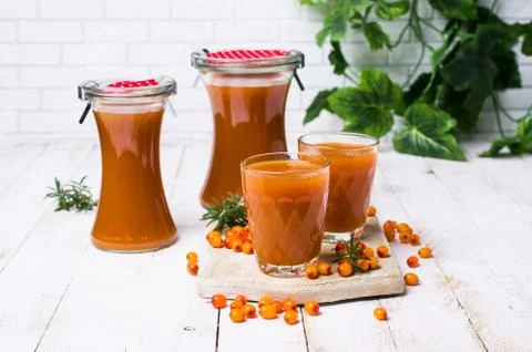 Thick orange drink Stock Photos