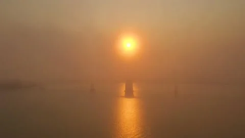 Thick orange haze from Glass Fire in Napa over the San Francisco Bay Bridge Stock Footage 140415007