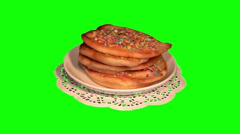 Thick pancakes with colored coconut shaving on saucer on paper napkin Stock Footage 48612048