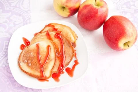 Thick pancakes with sweet syrup Stock Photos