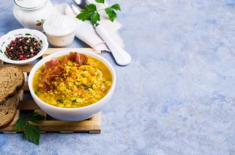 Thick pea soup with bacon Stock Photos