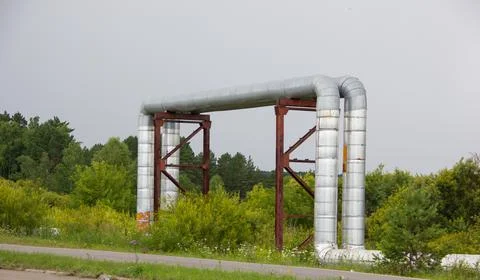 Thick pipes through which hot water is supplied Stock Photos