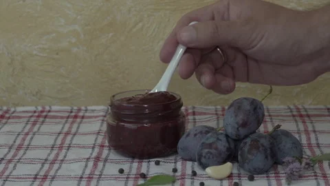 Thick plum sauce take with a spoon Stock-Footage 322159248
