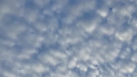 Thick puffy clouds Stock Footage 233560219