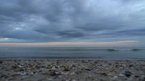 Thick rainy clouds over waving sea. Stock Footage 134605508
