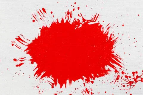 Thick red acrylic paint applied in an uneven patch on a flat surface Stock Photos