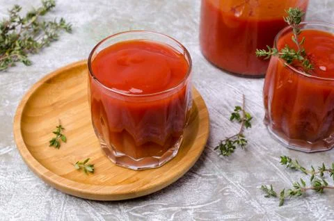 Thick red vegetable juice Stock Photos