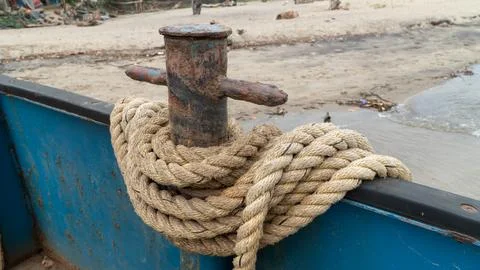 Thick rope on the deck of a ship Stock Photos