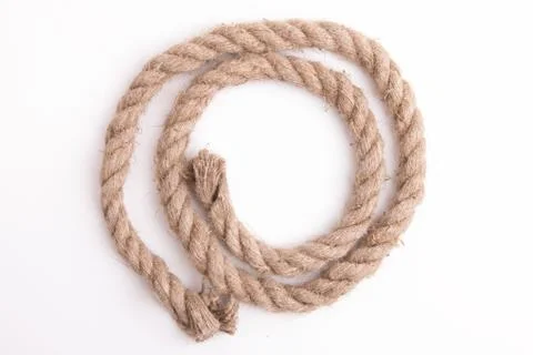 Thick rope on a white background. Stock Photos