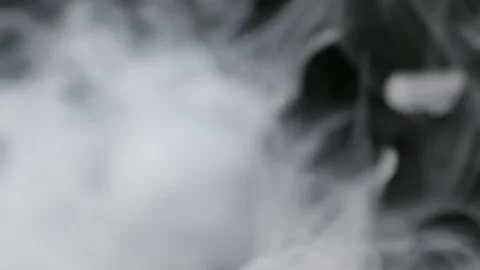 Thick smoke on a black background. Gray fog. Smoke and fire. Stock Footage 307675701