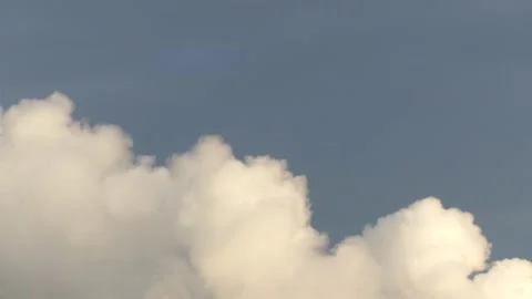 Thick smoke from a chimney - blue sky, real time - abstract background Stock Footage 145686233