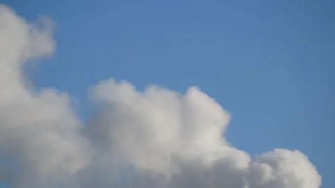 Thick smoke from a chimney - blue sky, time lapse - abstract background Stock Footage 146810384
