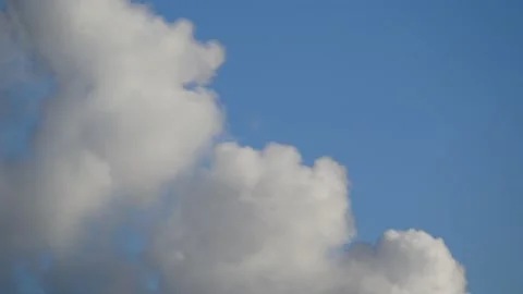 Thick smoke from a chimney - blue sky, time lapse - abstract background Stock Footage 146812565