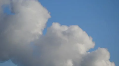 Thick smoke from a chimney - blue sky, time lapse - abstract background Stock Footage 146814436