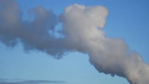 Thick smoke from a chimney - blue sky, time lapse - abstract background Stock Footage 146829945