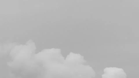Thick smoke from a chimney in the sky in time lapse - monochrome background Stock Footage 145221404