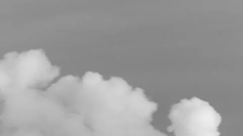 Thick smoke from a chimney in the sky in time lapse - monochrome background Stock Footage 145683865