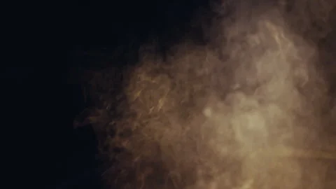 Thick smoke or steam rising from hot grill against dark nighttime background. at Stock Footage 346494929