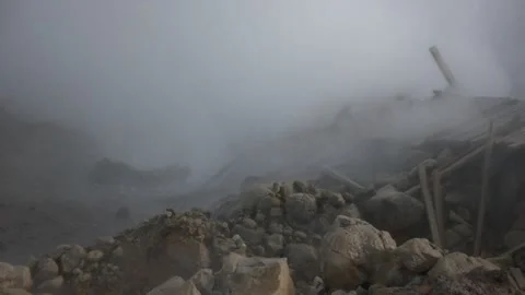 Thick Steam Envelops Rocky Terrain at Gunnuhver Geyser, Iceland Stock Footage 346007239