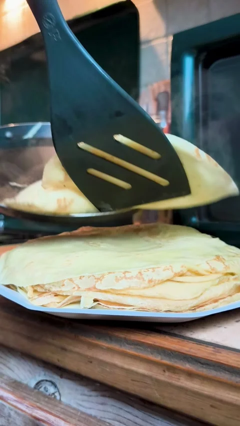 Thick Steam Rising From Stack Of Fresh Crepes Video stock 325191034
