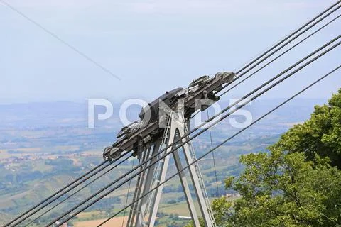 Thick steel cables and pulleys for the Transportation cableway in the mountai Stock Photos