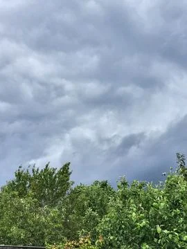Thick storm clouds in a blue sky, meteorology and climate change Stock-Fotos