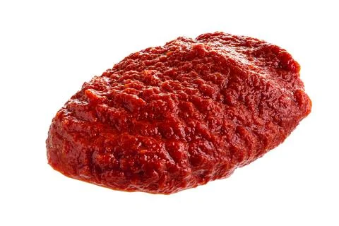 Thick tomato paste isolated on white Stockfoto's
