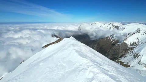 Thick white clouds covering high Alpine mountain ranges Stock-Footage 341328552