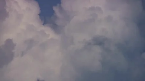 Thick white clouds pack together filling the entire frame Stock Footage 329756706
