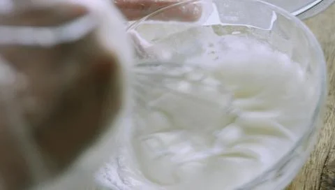 Thick White Meringue-like Baking Mixture in a Glass Bowl Stock Photos
