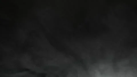 Thick white smoke flying from side on dark background 스톡 동영상 265879775