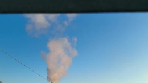 Thick white smoke pours out from a factory chimney. Stock Footage 328446590