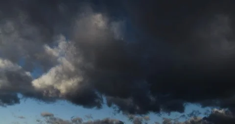 Thick Wispy Clouds Blue Sky Timelapse 4K Stock Footage 113899471