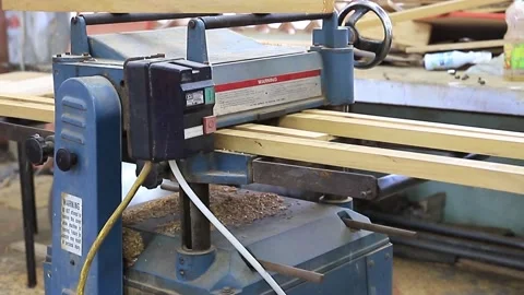 Thicknesser planer machine being used to plane stock Video stock 151639663
