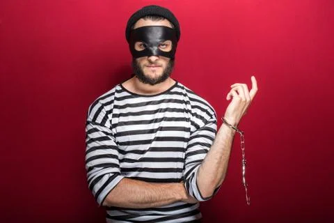 Thief arrested as a consequence of his crime Stock Photos