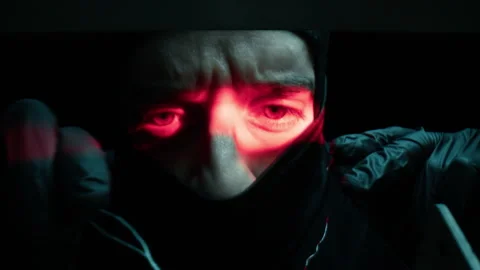 Thief With Balaclava Carefully Trying To Open The Lock Video stock 272504506