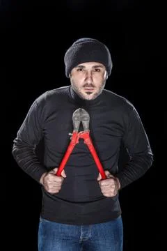Thief on black Stock Photos