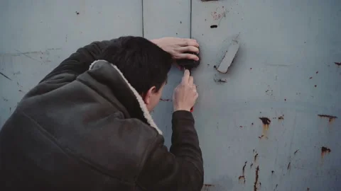 Thief breaks into garage lock Stock Footage 152421715