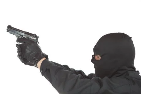 Thief with gun Фото